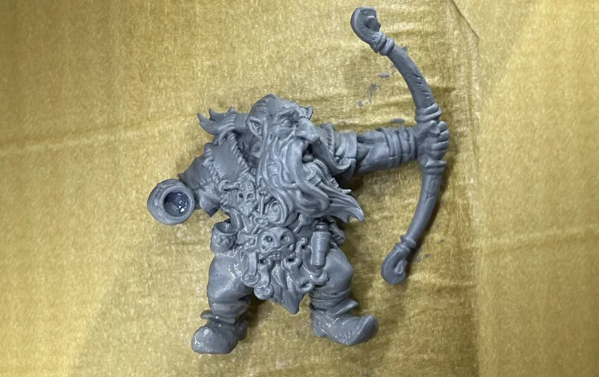 Mountain Dwarf Ranger miniature after applying gray primer