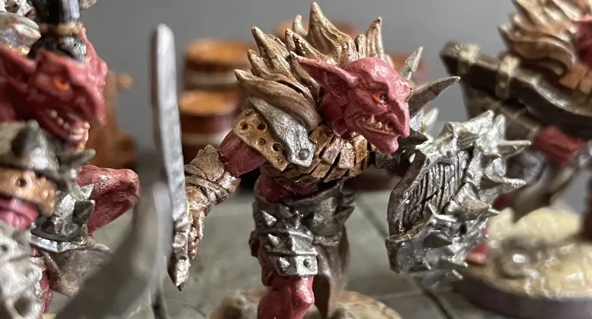 Blackrazor Hobgoblin miniature carrying a scimitar and shield